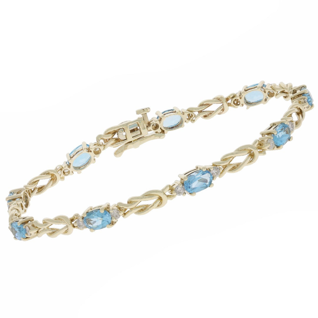 Sky Blue Topaz Love Knot Bracelet 14K Yellow Gold 4.32 CTW
