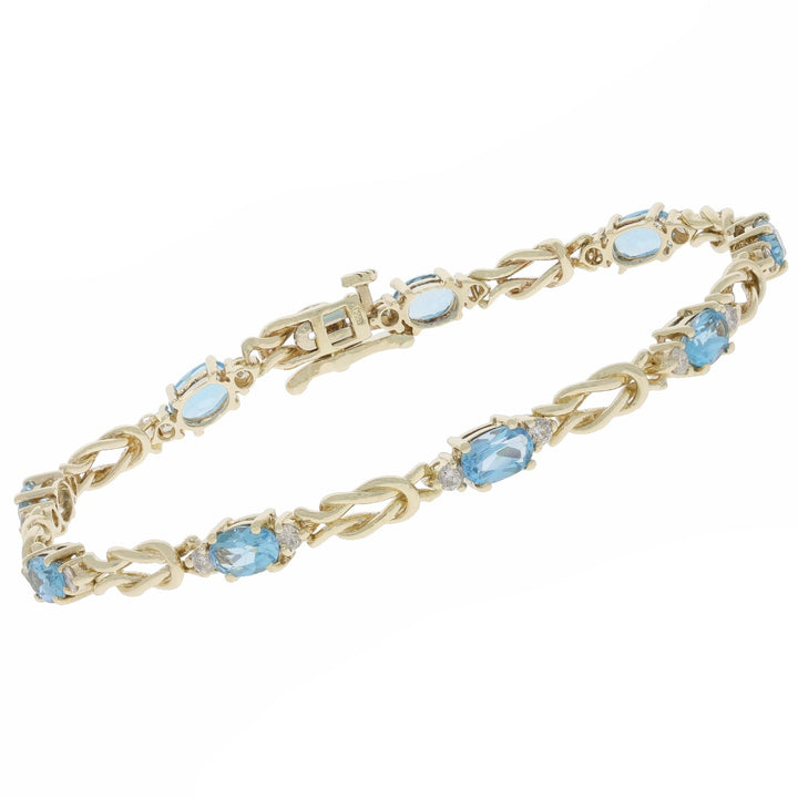 Sky Blue Topaz Love Knot Bracelet 14K Yellow Gold 4.32 CTW