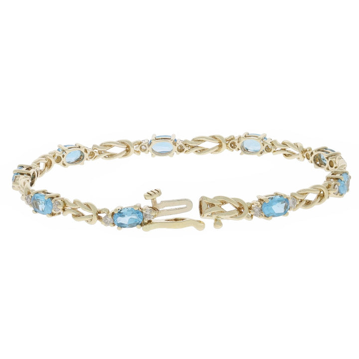 Sky Blue Topaz Love Knot Bracelet 14K Yellow Gold 4.32 CTW