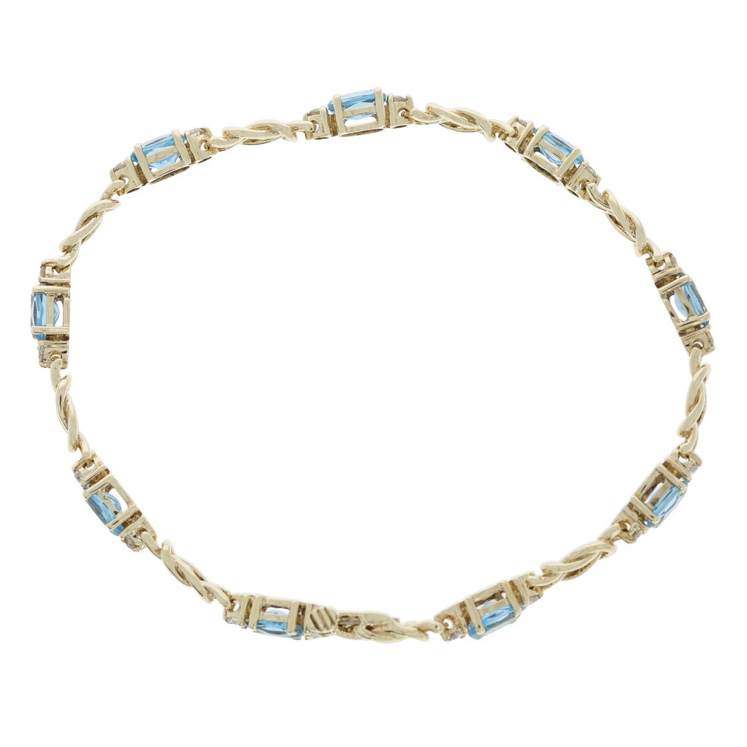 Sky Blue Topaz Love Knot Bracelet 14K Yellow Gold 4.32 CTW