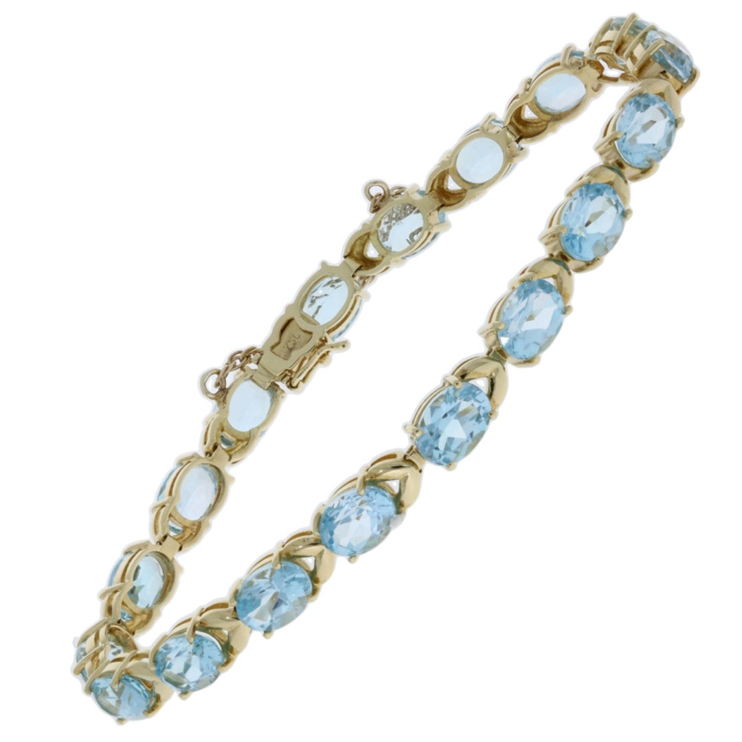 Blue Topaz Tennis Bracelet 14K Yellow Gold 18 CTW