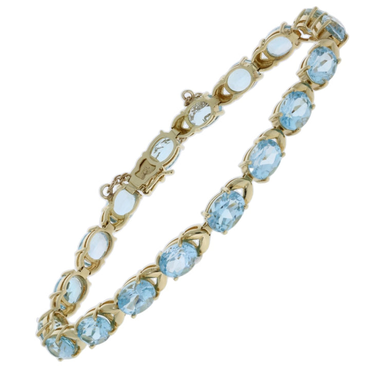 Blue Topaz Tennis Bracelet 14K Yellow Gold 18 CTW