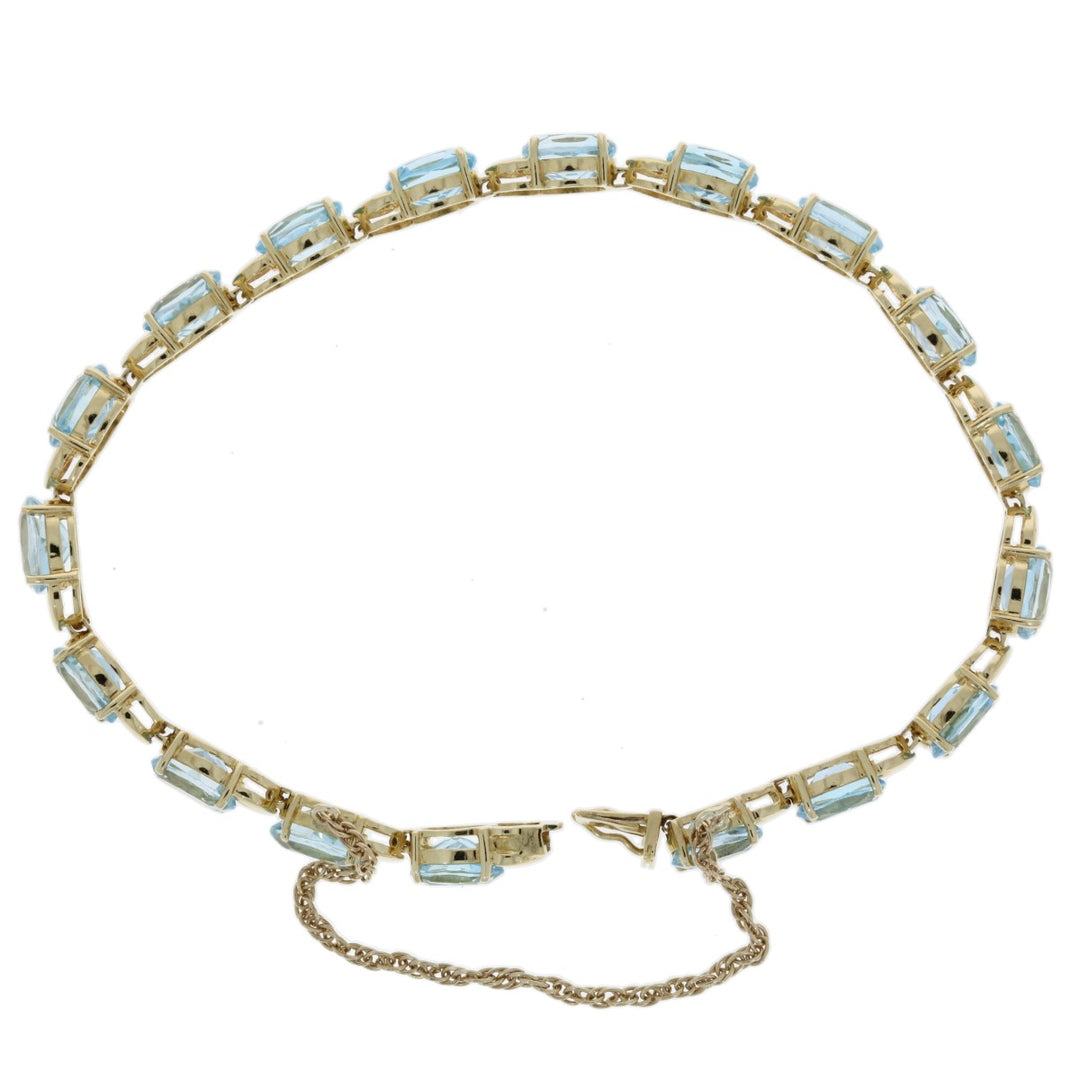 Blue Topaz Tennis Bracelet 14K Yellow Gold 18 CTW