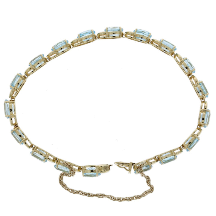 Blue Topaz Tennis Bracelet 14K Yellow Gold 18 CTW