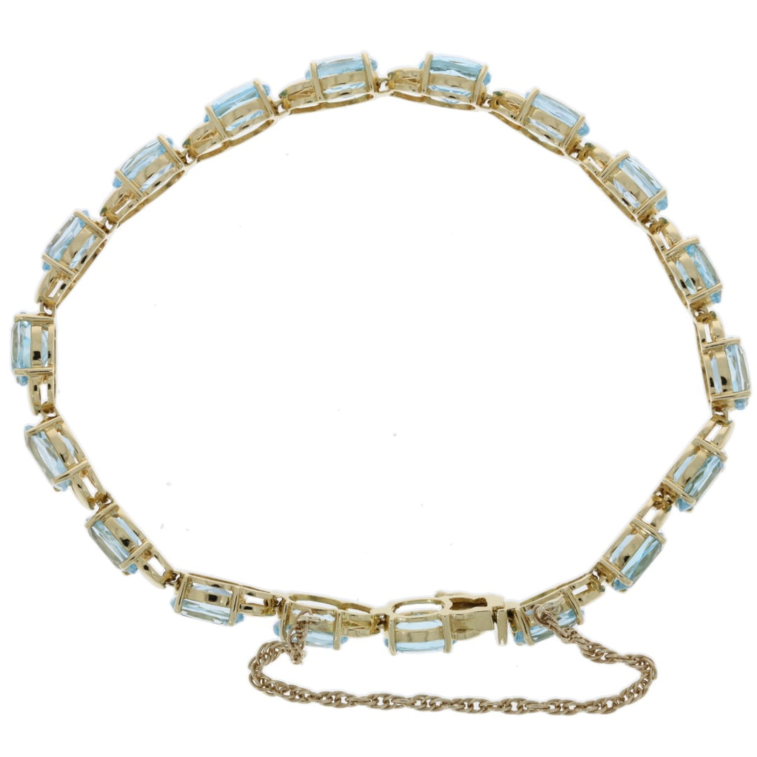 Blue Topaz Tennis Bracelet 14K Yellow Gold 18 CTW