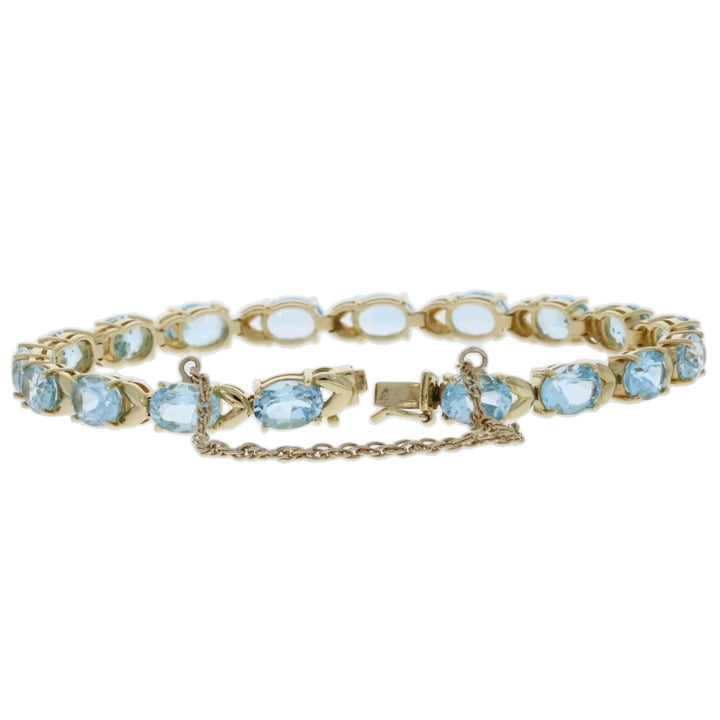 Blue Topaz Tennis Bracelet 14K Yellow Gold 18 CTW