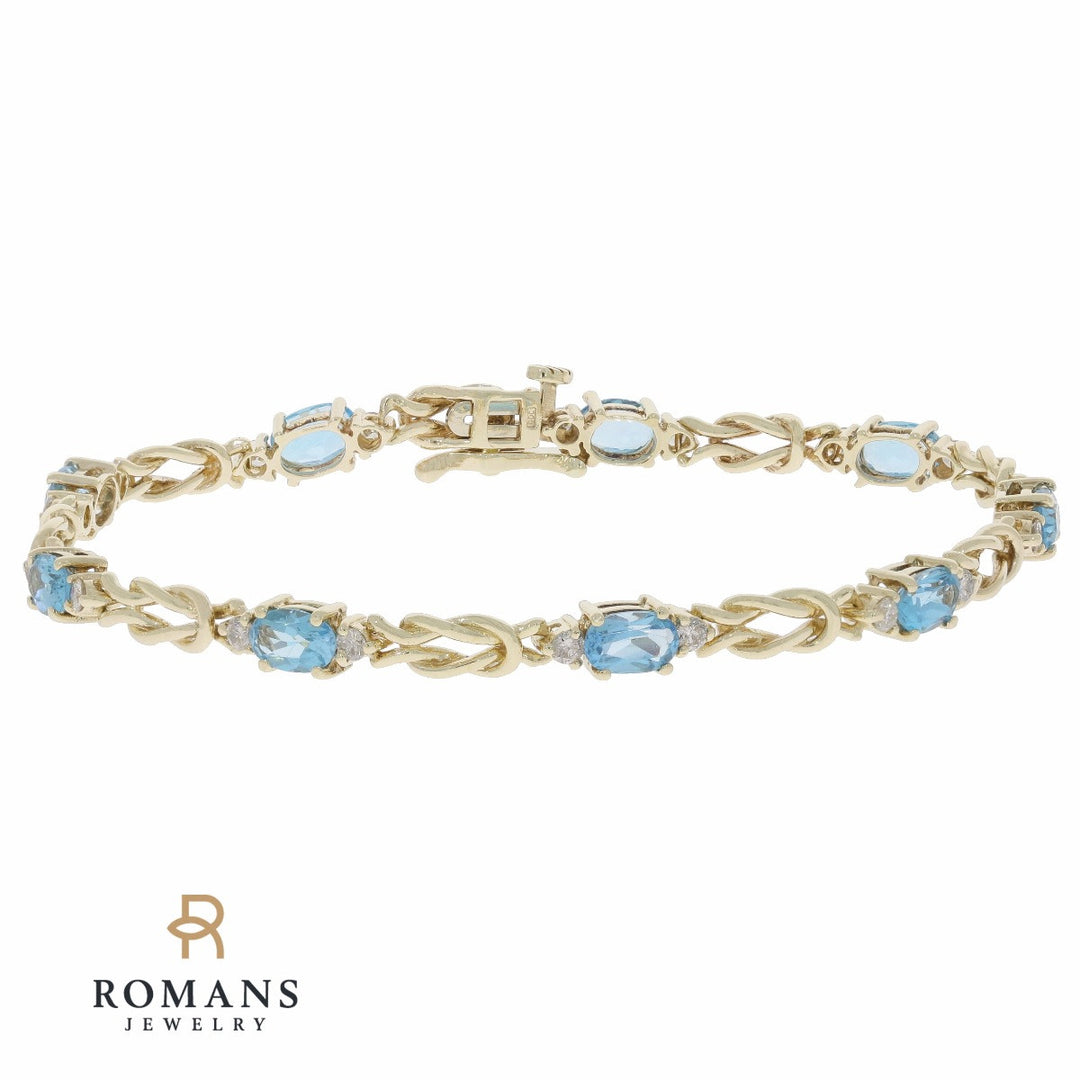 Sky Blue Topaz Love Knot Bracelet 14K Yellow Gold 4.32 CTW