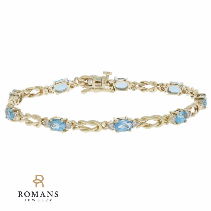 Sky Blue Topaz Love Knot Bracelet 14K Yellow Gold 4.32 CTW