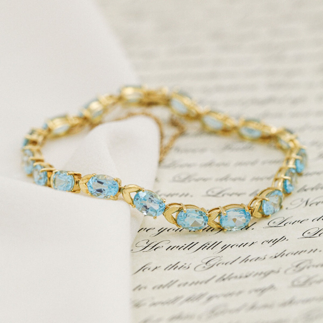 Blue Topaz Tennis Bracelet 14K Yellow Gold 18 CTW