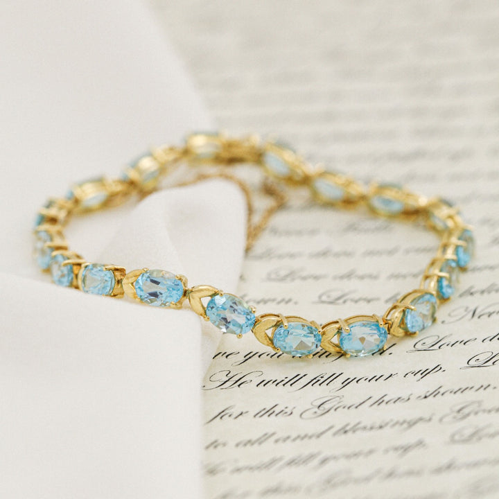 Blue Topaz Tennis Bracelet 14K Yellow Gold 18 CTW
