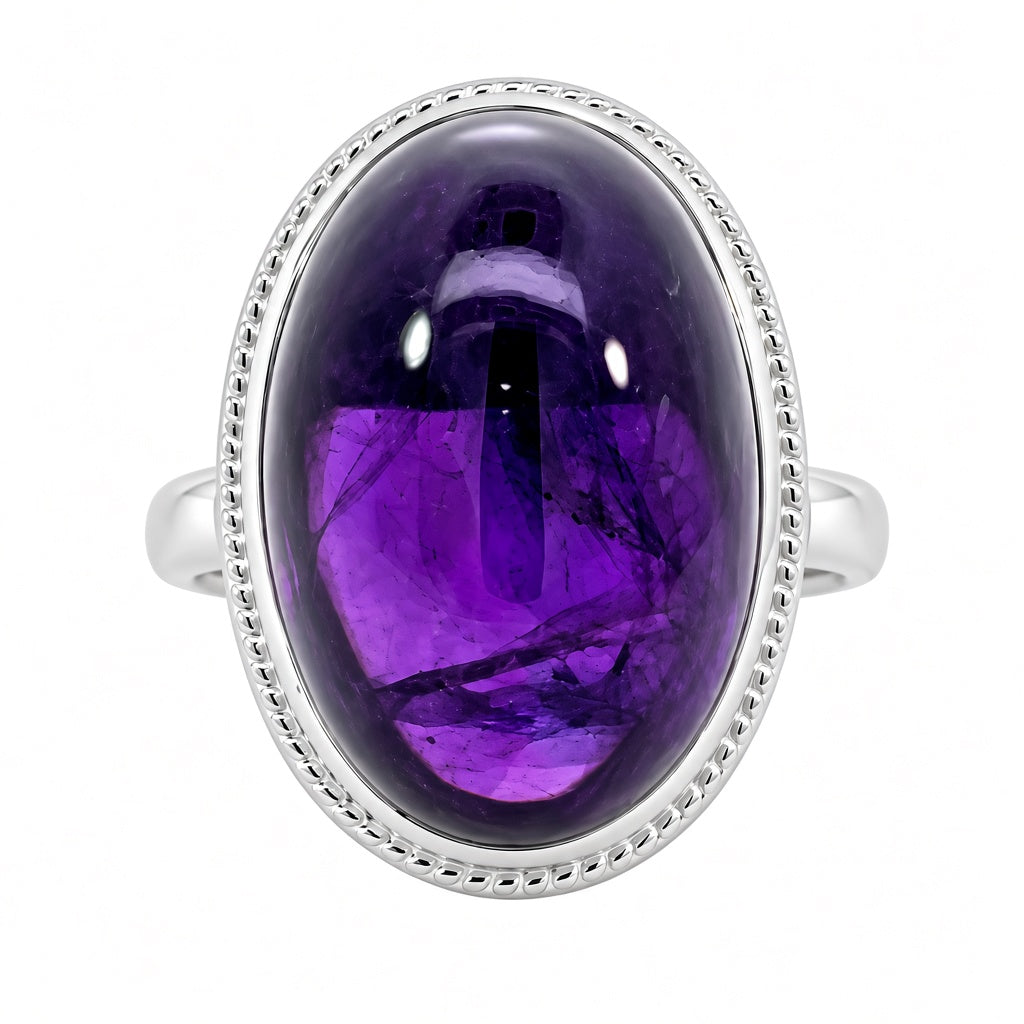 14K white gold amethyst solitaire ring featuring a large 12.07CT polished purple cabochon amethyst gemstone.
