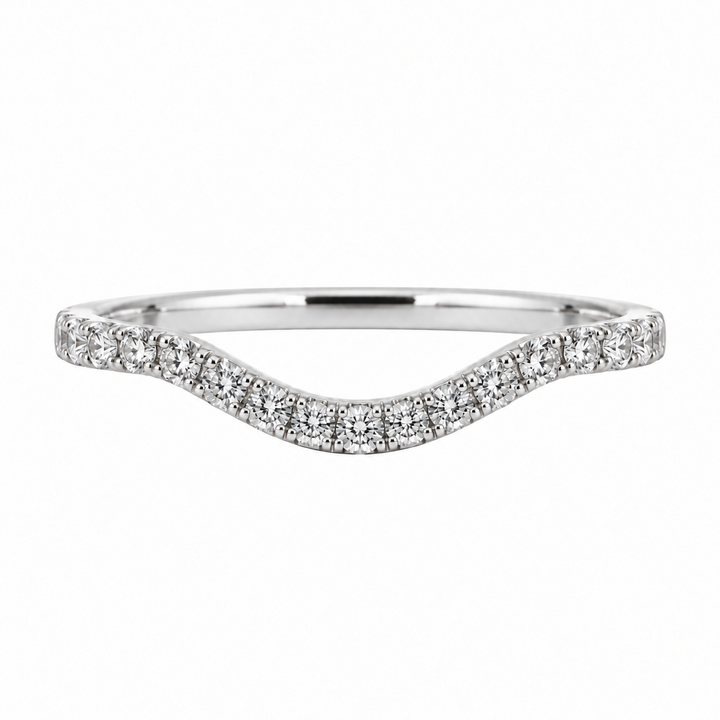 14K white gold curved diamond wedding band featuring 0.32CTW diamonds in an elegant contour design.