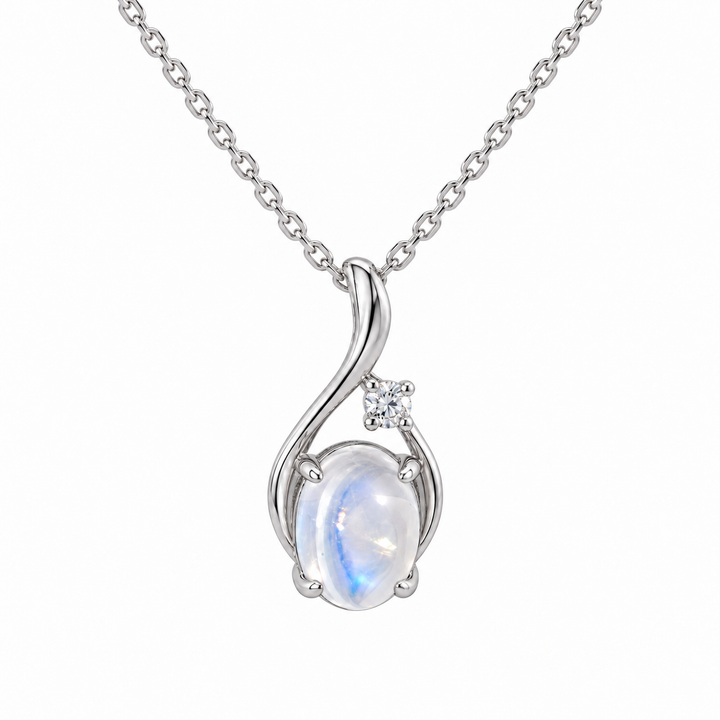 14K white gold moonstone and diamond swirl pendant featuring a 1.37CT moonstone accented by sparkling diamonds in a graceful curved design.