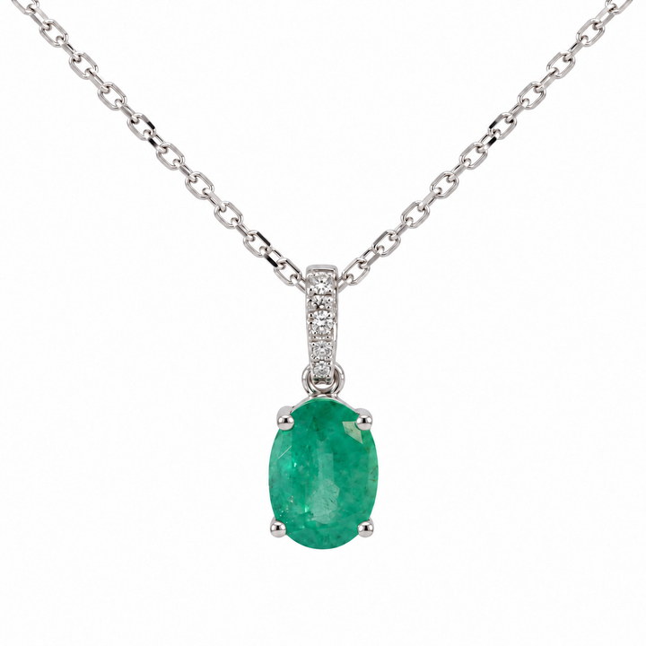 14K white gold emerald and diamond pendant featuring a 0.79CT natural emerald accented with sparkling diamonds.