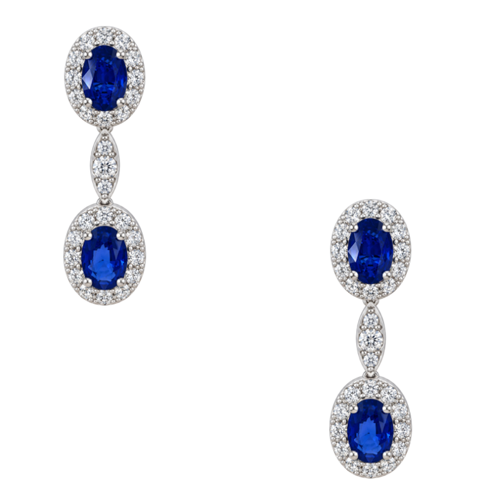 14K white gold sapphire and diamond halo dangle earrings featuring natural oval sapphires surrounded by sparkling diamonds, totaling 3.23CTW.