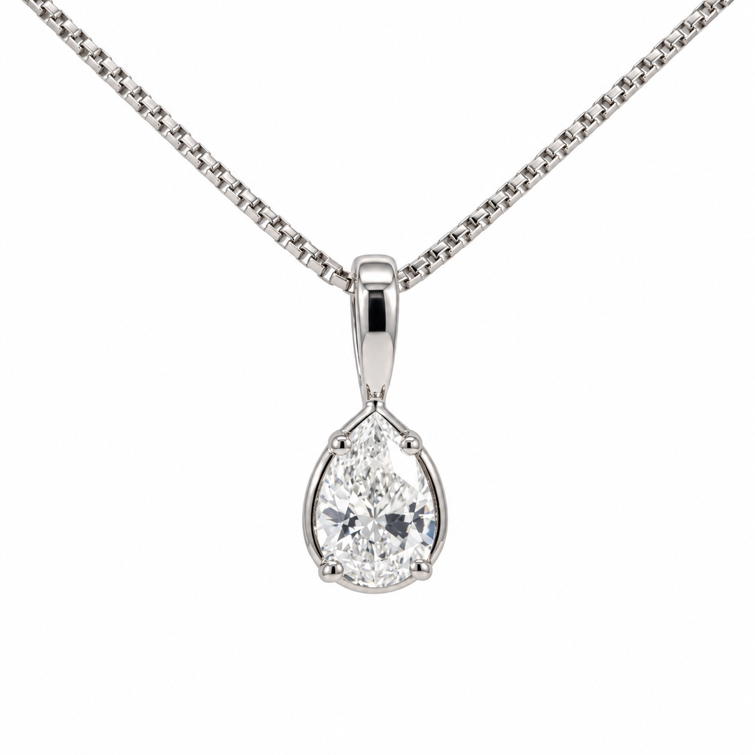 14K white gold pear shaped natural diamond pendant featuring 0.39CTW diamonds in an elegant teardrop design.