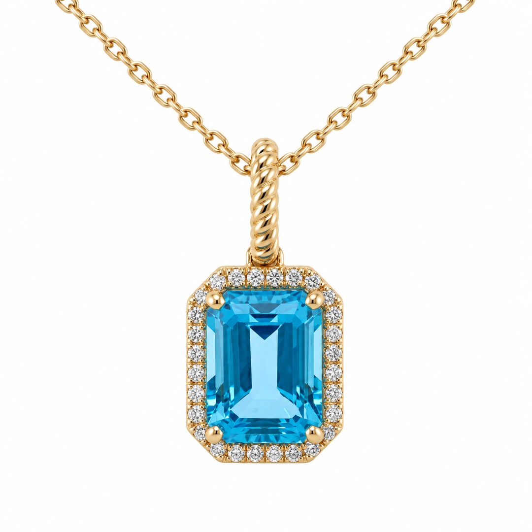 14K yellow gold blue topaz and diamond halo pendant featuring a 2.23CT blue topaz gemstone surrounded by sparkling diamonds.