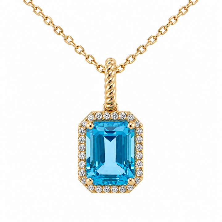 14K yellow gold blue topaz and diamond halo pendant featuring a 2.23CT blue topaz gemstone surrounded by sparkling diamonds.