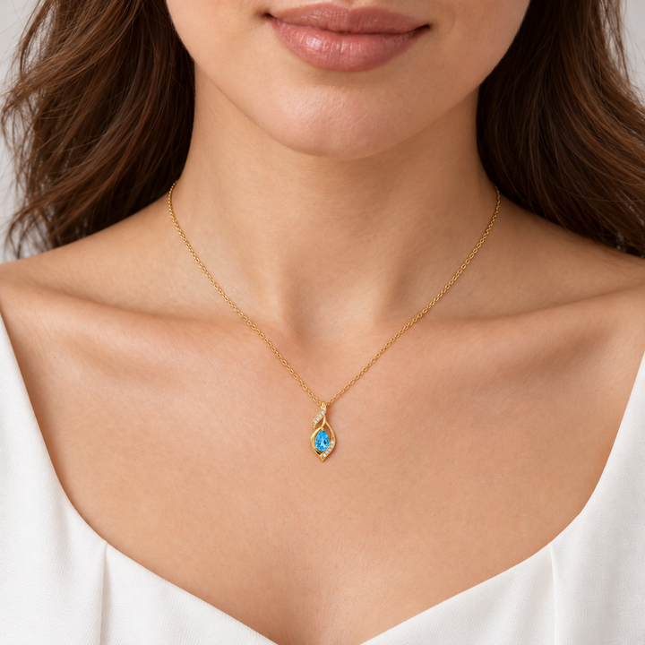 Blue Topaz &amp; Diamond Swirl Pendant 14K Yellow Gold 0.87CTW