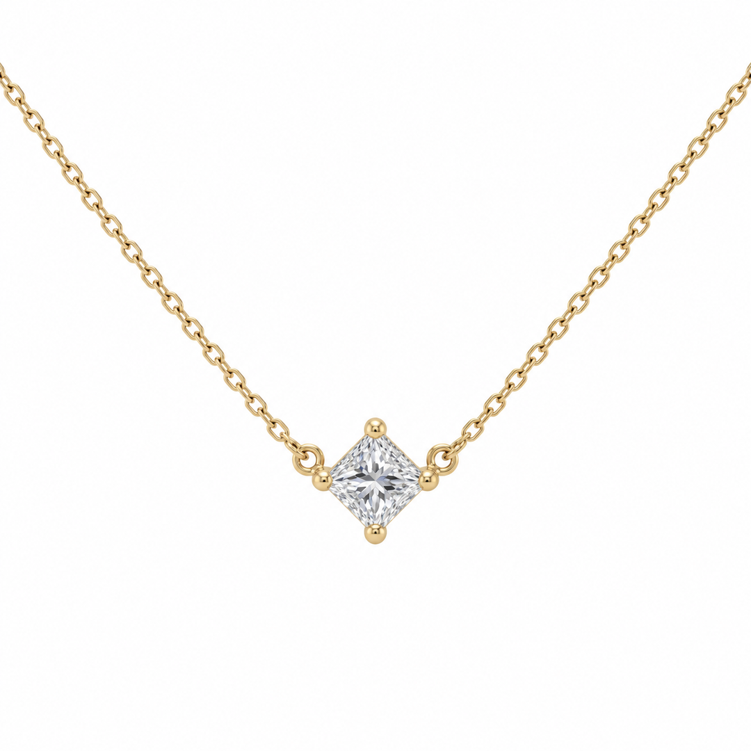 14K yellow gold princess cut diamond floating necklace featuring a 0.29CT diamond solitaire pendant in a delicate design.