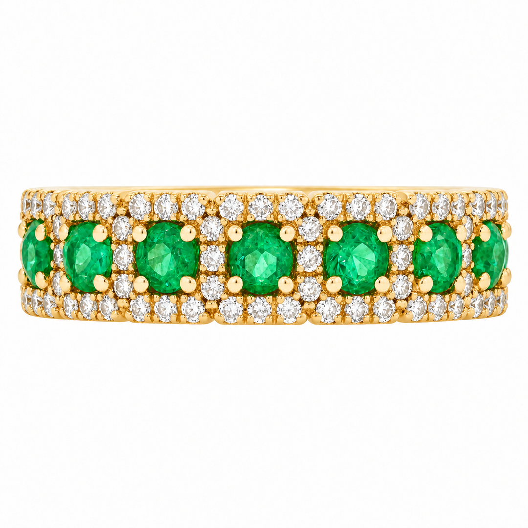 18K yellow gold emerald and diamond halo band featuring 0.83CTW emeralds and diamonds in an elegant gemstone ring design.
