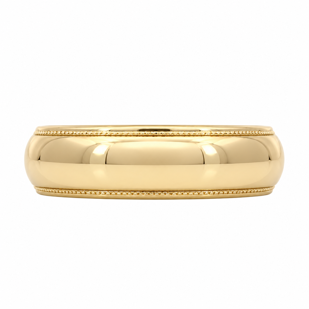 Classic 14K yellow gold 5MM band with vintage inspired milgrain edges. A timeless estate design perfect as a wedding band or everyday ring with lasting style.