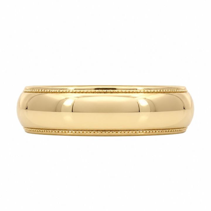 Classic 14K yellow gold 5MM band with vintage inspired milgrain edges. A timeless estate design perfect as a wedding band or everyday ring with lasting style.