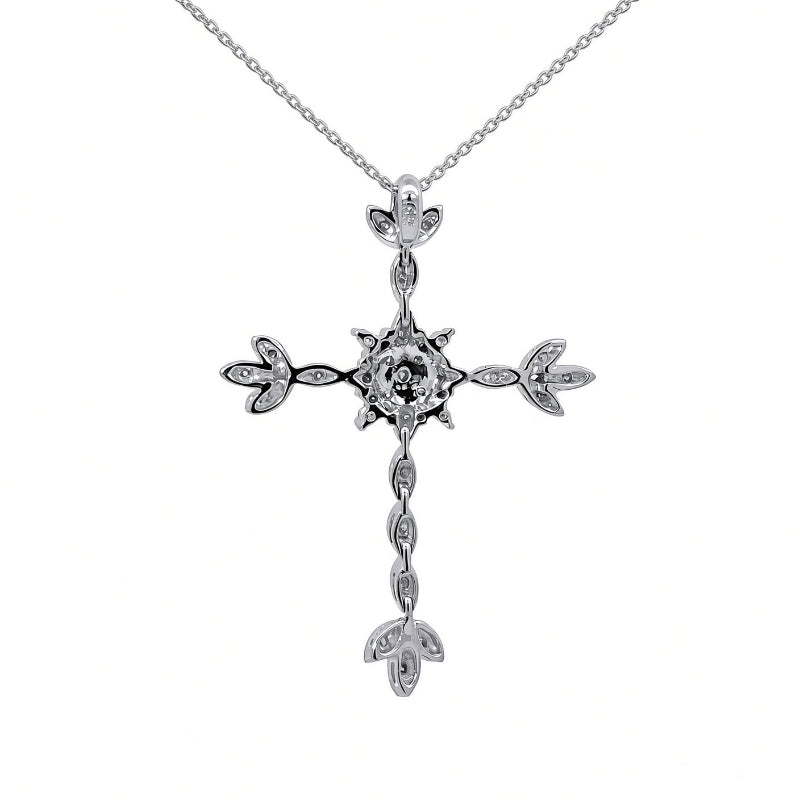 A silver cross pendant necklace with a central clear gemstone and small clear stones along the arms and dangle