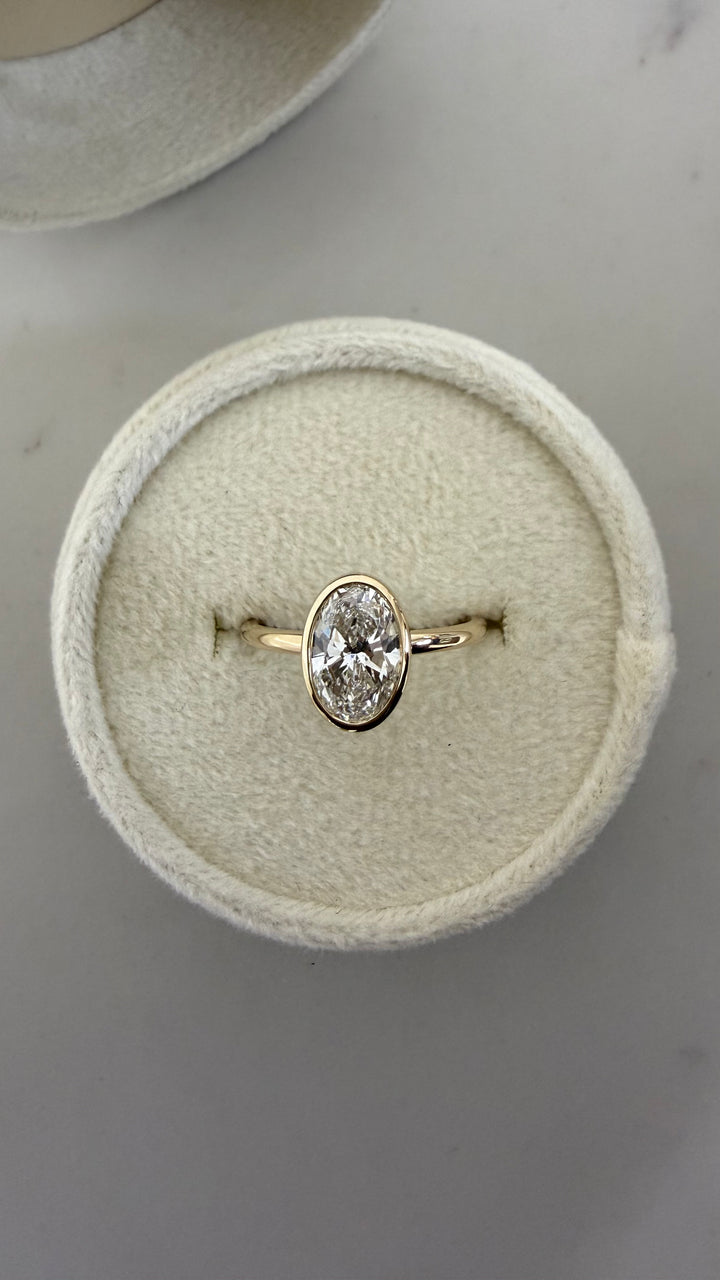 Roma Bezel Solitaire 1.50CT Oval Lab Diamond 14K Yellow Gold
