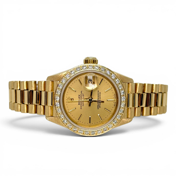 Rolex President 18K Yellow Gold Diamond Bezel Champagne Dial 26mm Ref. 69138