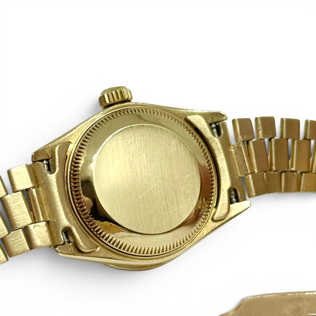 Rolex President 18K Yellow Gold Diamond Bezel Champagne Dial 26mm Ref. 69138