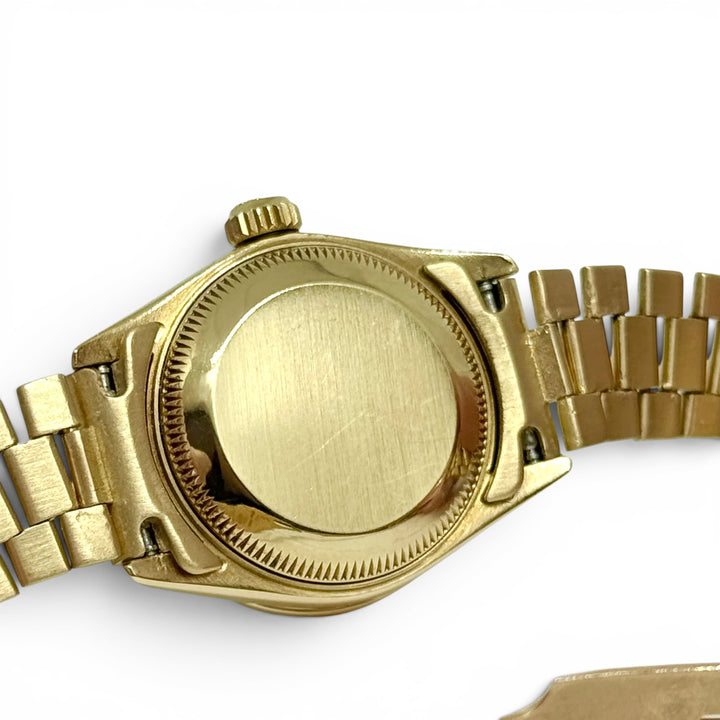 Rolex President 18K Yellow Gold Diamond Bezel Champagne Dial 26mm Ref. 69138