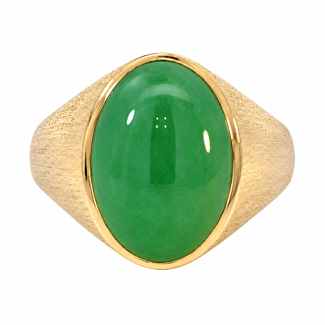 Elegant 14K yellow gold jade cabochon ring featuring a polished natural jade centerpiece. A timeless design with classic beauty and everyday sophistication.