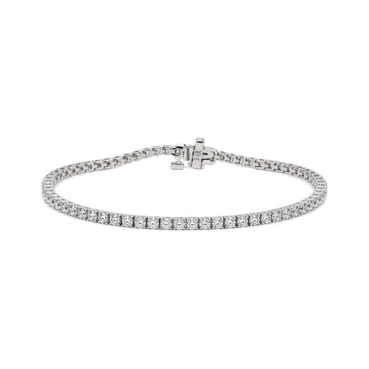 Shop this 14K white gold tennis bracelet featuring 1.66CTW natural round diamonds. A timeless fine jewelry essential with brilliant sparkle and elegance.