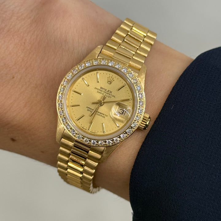 Rolex President 18K Yellow Gold Diamond Bezel Champagne Dial 26mm Ref. 69138