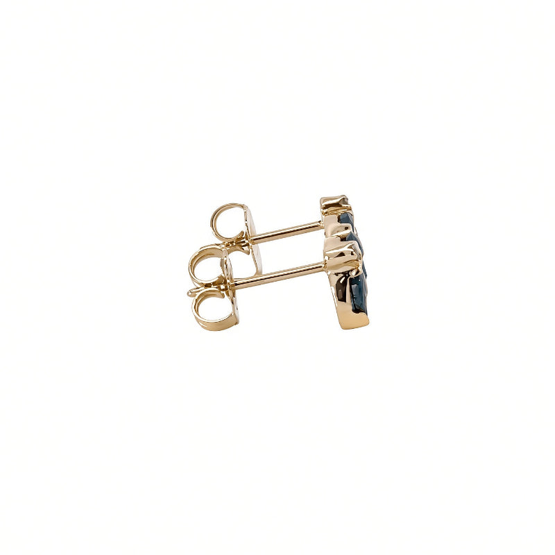 A pair of gold post earrings set with dark blue stones