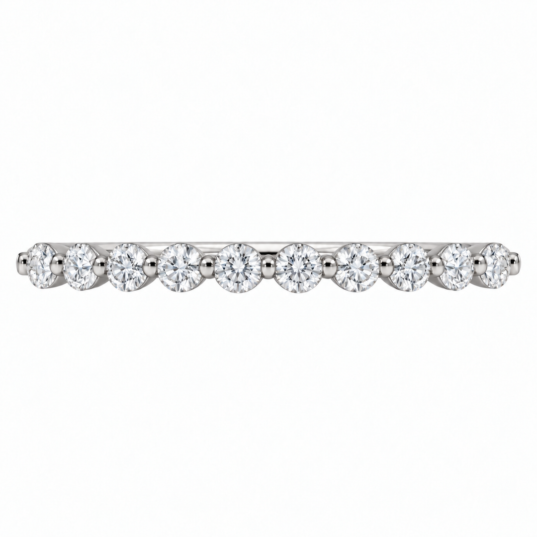 Classic platinum diamond wedding band featuring 0.24CTW diamonds in an elegant shared prong setting.