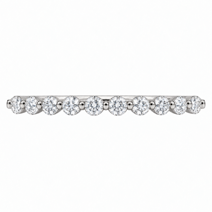 Classic platinum diamond wedding band featuring 0.24CTW diamonds in an elegant shared prong setting.