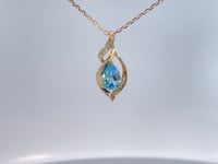 Blue Topaz &amp; Diamond Swirl Pendant 14K Yellow Gold 0.87CTW