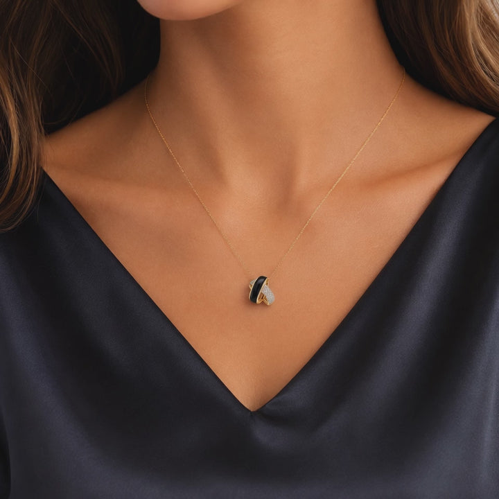 Onyx Diamond Intertwined Pendant .21CTW 18K Yellow Gold